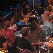 People eating outdoors at Cafemantic in Willimantic